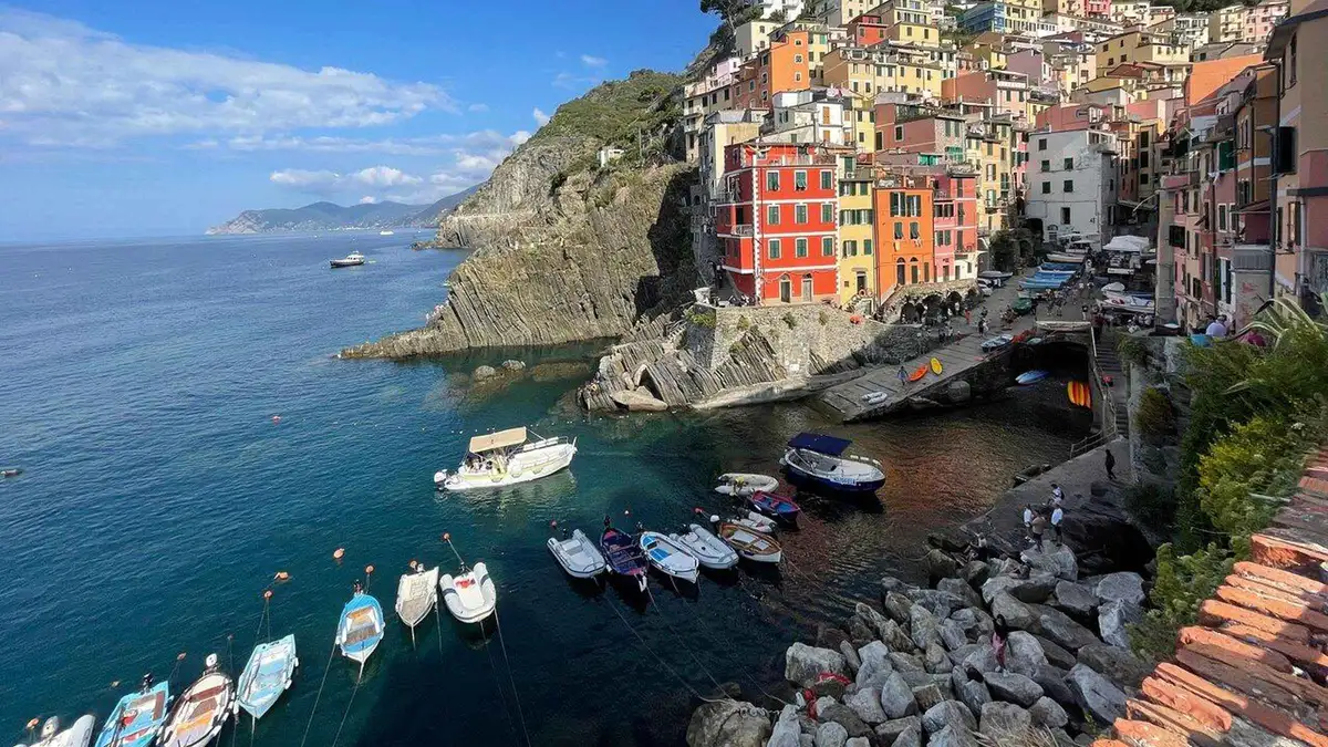 Boat cruise past Manarola on a Cinque Terre day trip with street food option from on a day trip from Florence