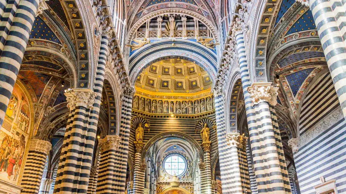 Mosaic marble floor of Siena Cathedral covered by the OPA SI Pass, a Siena day trip from Florence