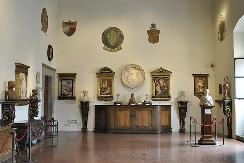 The courtyard and stone staircase of the Bargello museum, a skip-the-line sculpture museum ticket